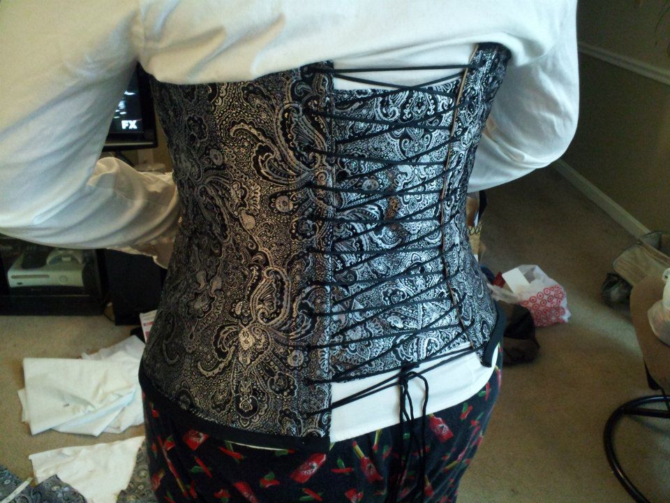 Silver corset from back